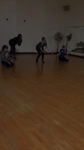 Students play a game of Goal Ball (blind soccer).